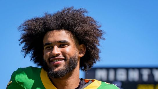Oregon's Dante Moore: Return about natty, not dodging Jets (College Football). Photo by Ben Lonergan/The Register-Guard / USA TODAY NETWORK via Imagn Images