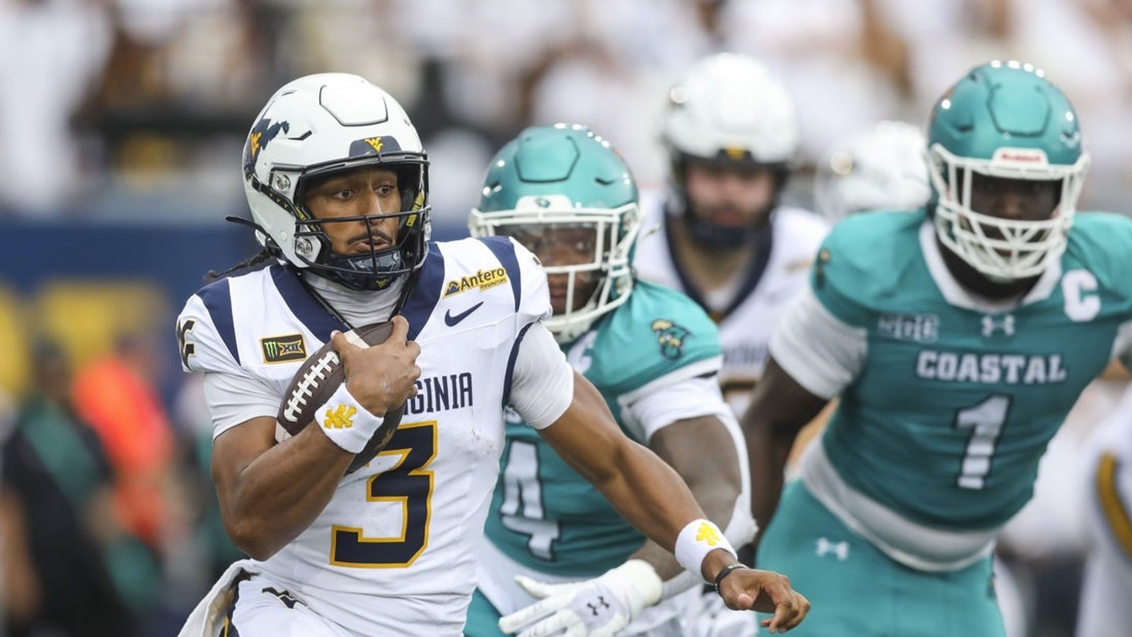 QB Michael Hawkins Jr. leads WV to victory over Coastal Carolina in debut
