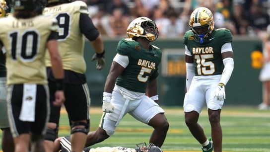 Colorado WR DeAndre Moore injured on hit, leaves game (College Football). Photo by Chris Jones