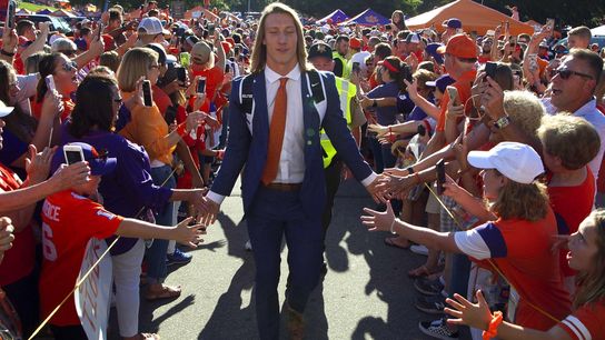 Aug 29, 2019; Clemson, SC, USA; Clemson Tigers quarterback Trevor Lawrence (16) greets fans during Tiger Walk prior to a game against the Georgia Tech Yellow Jackets at Clemson Memorial Stadium. Mandatory Credit: Joshua S. Kelly-USA TODAY Sports