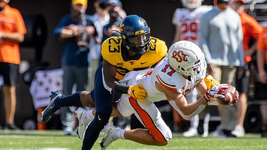 Big second quarter powers No. 15 Oklahoma St. past West Virginia (College Football)