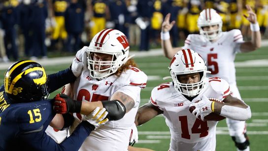 No. 13 Wisconsin manhandles Michigan, 49-11 (College Football)