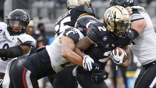 No. 7 Bearcats rally to defeat UCF behind Ridder’s 4 TDs (College Football)