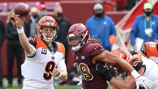 Bengals rookie QB Burrow carted off with injury (NFL)