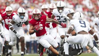 After opening loss, No. 18 Wisconsin faces MAC foe Eastern Michigan (College Football)