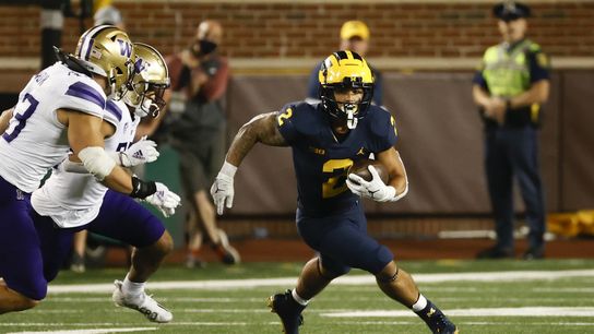 Michigan's ground game too much for Huskies (College Football)