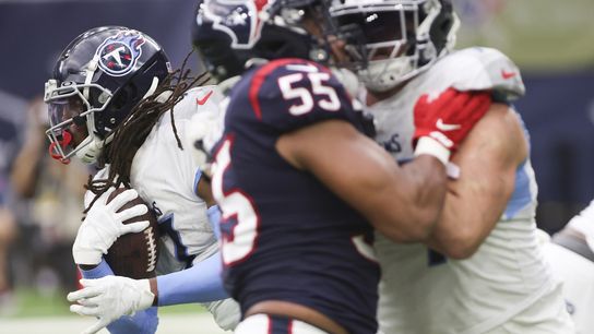 Titans wrap up AFC's top seed by turning back Texans (NFL)