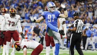 Lions DE Aidan Hutchinson (thigh) misses practice (NFL)