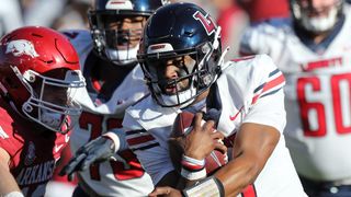 Liberty's key stop secures upset of Arkansas (College Football)