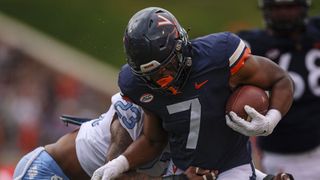 Virginia shooting survivor competes in spring game (College Football)