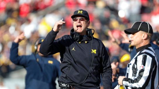 Suspension over, Jim Harbaugh returns to Michigan sideline (College Football)