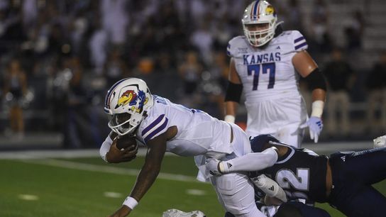 Kansas holds off Nevada with help of Devin Neal's 3 TDs (College Football)