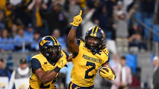 West Virginia DB Aubrey Burks taken from field on stretcher (College Football)