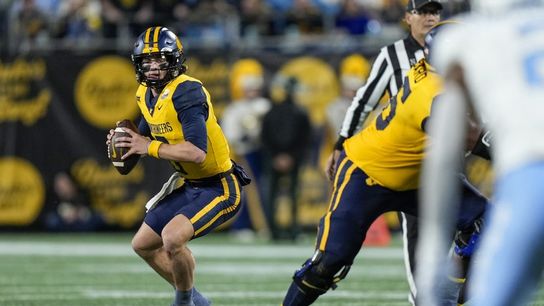 West Virginia's defense stuffs North Carolina in Mayo Bowl (College Football)