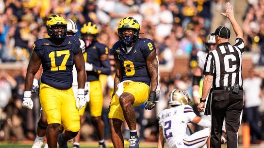 Two second-half interceptions fuel Wolverines past Huskies (College Football)