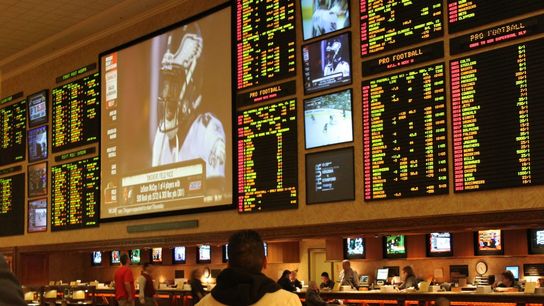 The Story Behind the Sports Betting Photo Seen Everywhere (NFL and College Football Betting Articles)