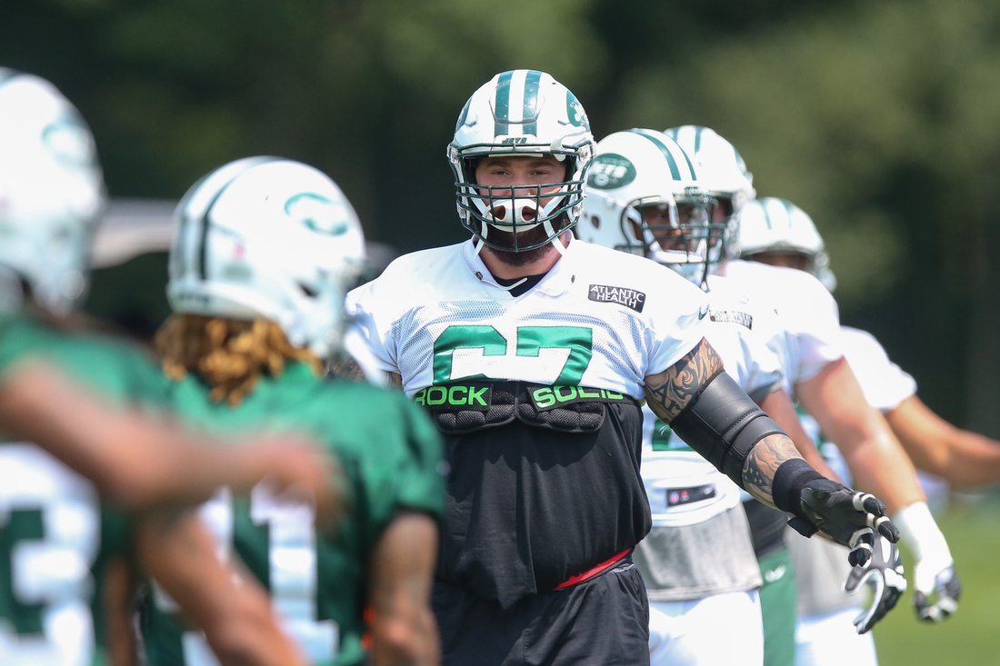 Jul 28, 2018; Florham Park, NJ, USA; New York Jets offensive guard Brian Winters (67) warms up during training camp at Atlantic Health Jets Training Center. Mandatory Credit: Vincent Carchietta-USA TODAY Sports