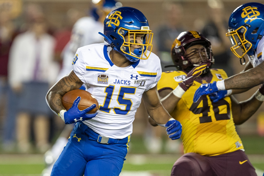 Aug 29, 2019; Minneapolis, MN, USA; South Dakota State Jackrabbits wide receiver Cade Johnson (15) rushes with the ball for a first down in the first quarter against the Minnesota Golden Gophers at TCF Bank Stadium. Mandatory Credit: Jesse Johnson-USA TODAY Sports