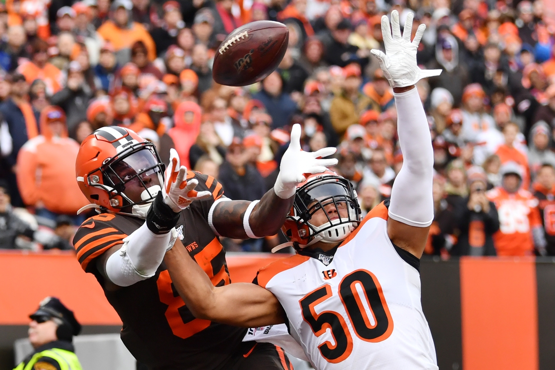 Dec 8, 2019; Cleveland, OH, USA; Cincinnati Bengals outside linebacker Jordan Evans (50) defends against a pass to Cleveland Browns tight end David Njoku (85) during the second half at FirstEnergy Stadium. The pass fell incomplete. Mandatory Credit: Ken Blaze-USA TODAY Sports