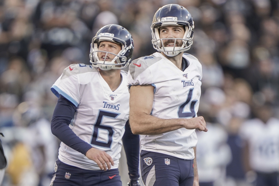 Dec 8, 2019; Oakland, CA, USA; Tennessee Titans kicker Ryan Succop (4) and punter Brett Kern (6) react after kicking for the extra point against the Oakland Raiders during the fourth quarter at Oakland Coliseum. Mandatory Credit: Stan Szeto-USA TODAY Sports