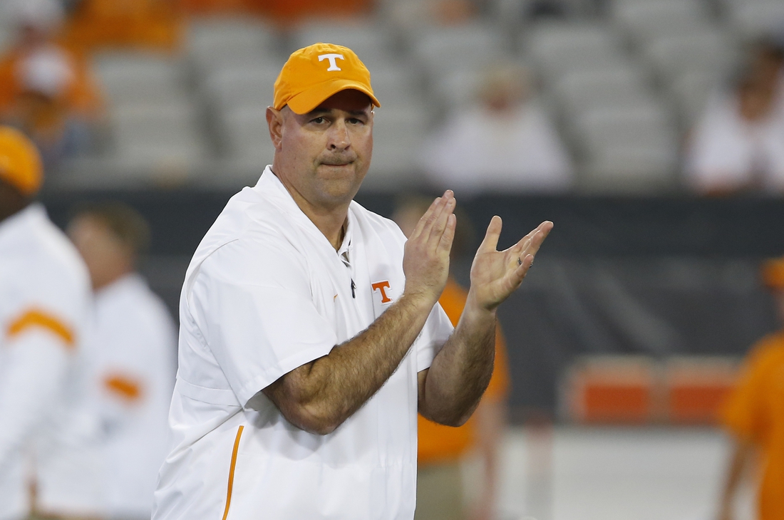 Jan 2, 2020; Jacksonville, Florida, USA;  Tennessee Volunteers head coach Jeremy Pruitt watches his team stretch out before the game against the Indiana Hoosiers in the 2020 Taxslayer Gator Bowl at TIAA Bank Field. Mandatory Credit: Reinhold Matay-USA TODAY Sports