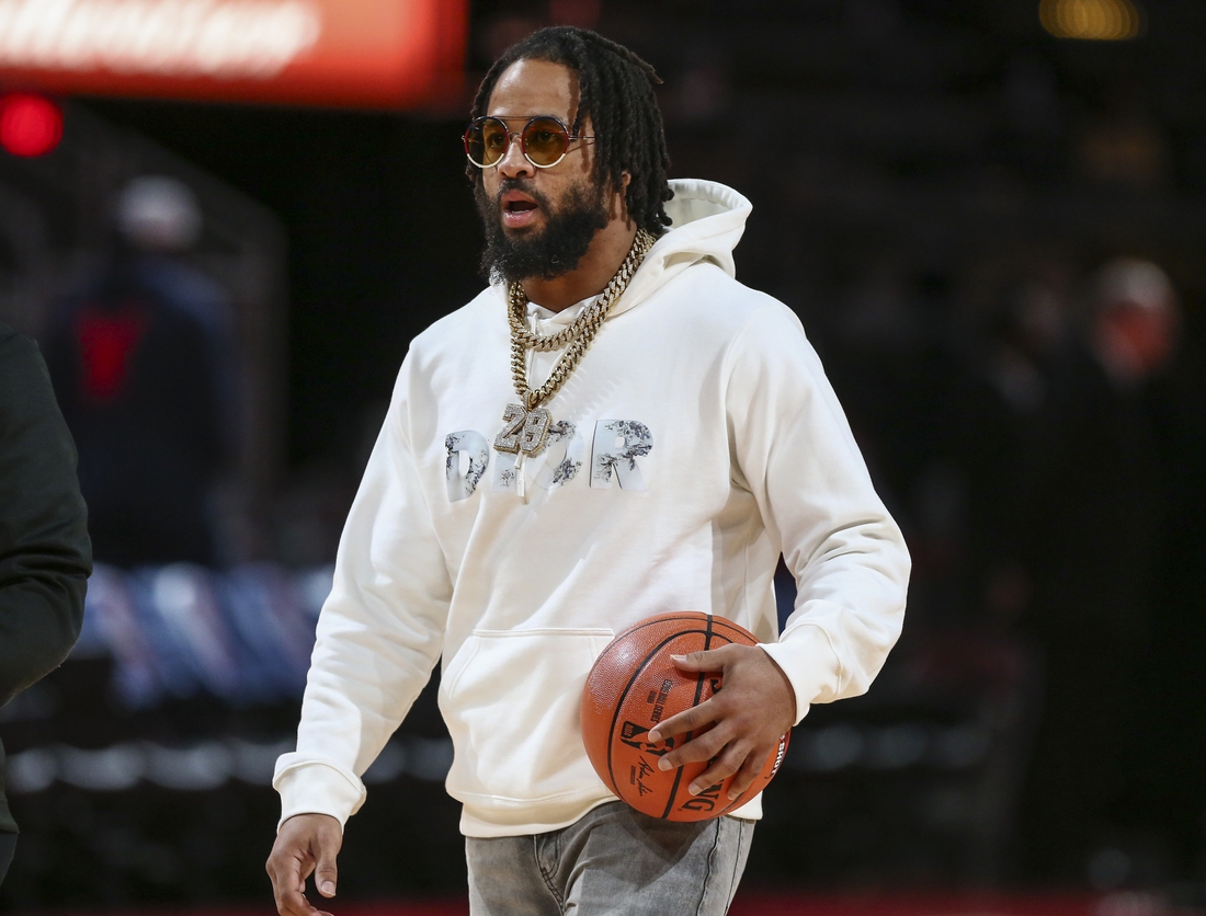 Mar 5, 2020; Houston, Texas, USA; Baltimore Ravens safety Earl Thomas walks on the court before a game between the Houston Rockets and the Los Angeles Clippers at Toyota Center. Mandatory Credit: Troy Taormina-USA TODAY Sports