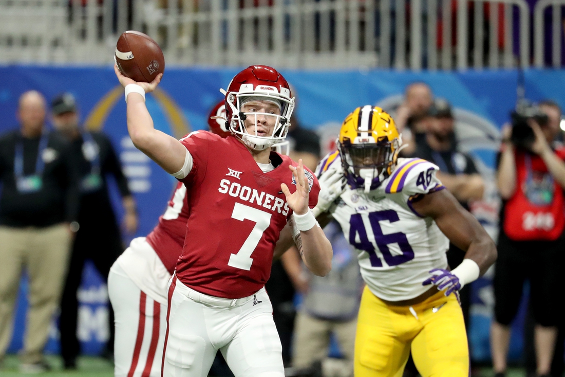 Dec 28, 2019; Atlanta, Georgia, USA; Oklahoma Sooners quarterback Spencer Rattler (7) attempts a pass during the 2019 Peach Bowl college football playoff semifinal game against the LSU Tigers at Mercedes-Benz Stadium. Mandatory Credit: Jason Getz-USA TODAY Sports