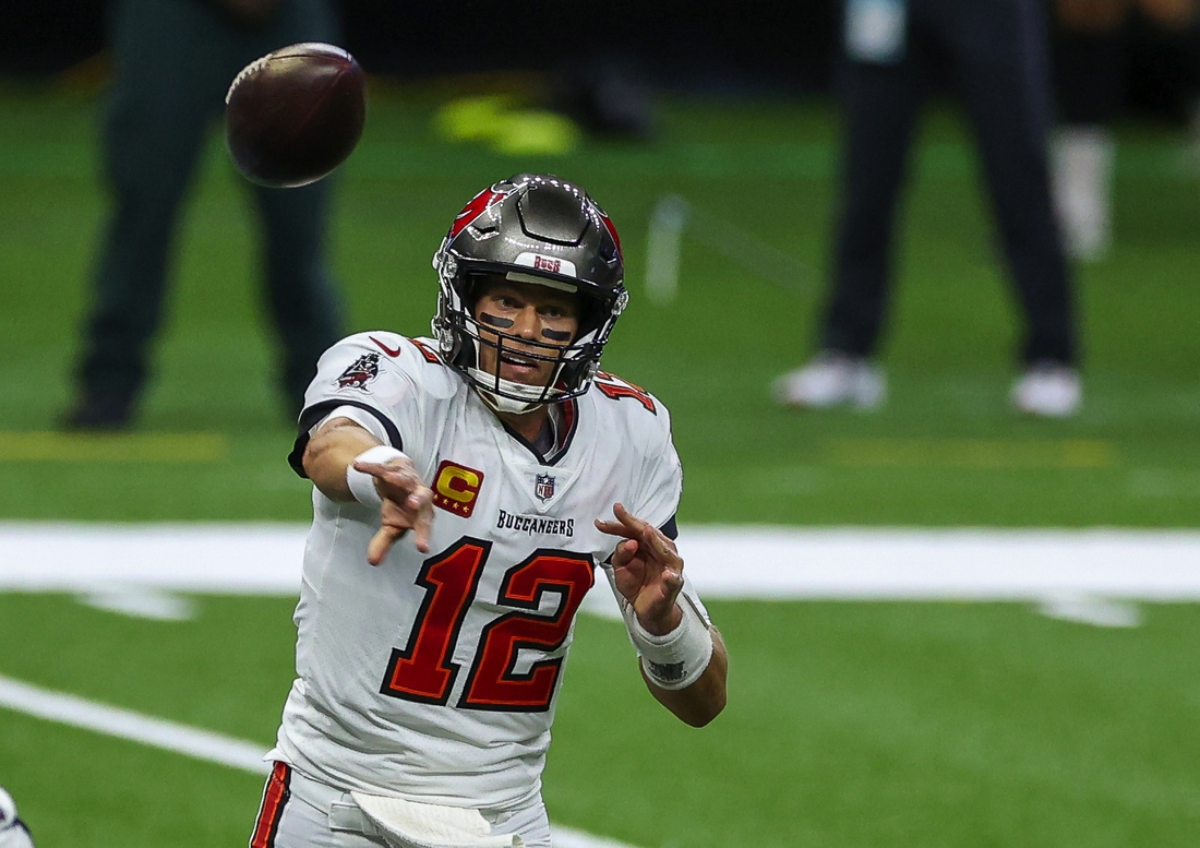 Sep 13, 2020; New Orleans, Louisiana, USA; Tampa Bay Buccaneers quarterback Tom Brady (12) throws against the New Orleans Saints during the first quarter at the Mercedes-Benz Superdome. Mandatory Credit: Derick E. Hingle-USA TODAY Sports