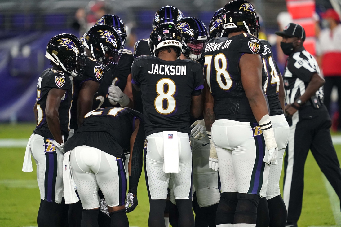 Sep 28, 2020; Baltimore, Maryland, USA; Baltimore Ravens  quarterback Lamar Jackson (8) huddles the offense in the first quarter against the Kansas City Chiefs at M&T Bank Stadium. Mandatory Credit: Mitch Stringer-USA TODAY Sports