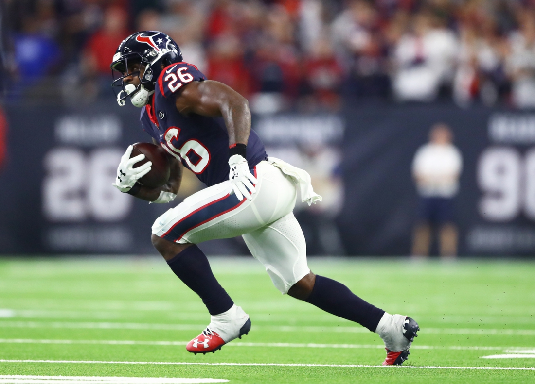 Jan 5, 2019; Houston, TX, USA; Houston Texans running back Lamar Miller (26) against the Indianapolis Colts in the AFC Wild Card playoff football game at NRG Stadium. Mandatory Credit: Mark J. Rebilas-USA TODAY Sports