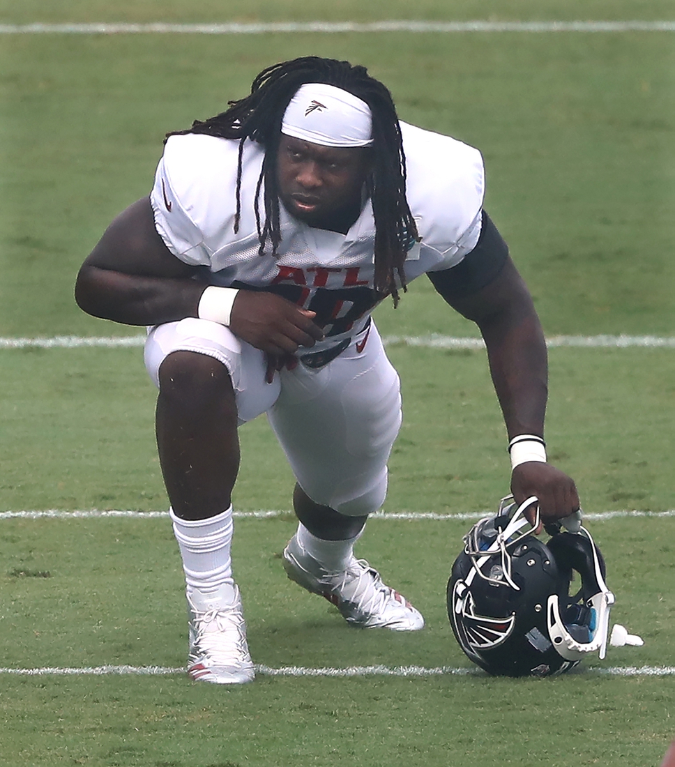Aug 22, 2020; Flowery Branch, Georgia, USA; Atlanta Falcons defensive end Takk McKinley loosens up during training camp at the Falcons training facility. Mandatory Credit: Curtis Compton/Pool Photo-USA TODAY Sports