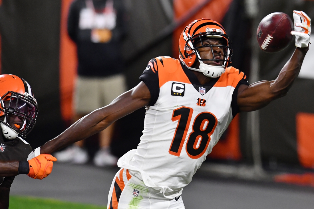 Sep 17, 2020; Cleveland, Ohio, USA; Cincinnati Bengals wide receiver A.J. Green (18) just misses a pass as Cleveland Browns free safety Karl Joseph (42) defends during the second half at FirstEnergy Stadium. Mandatory Credit: Ken Blaze-USA TODAY Sports