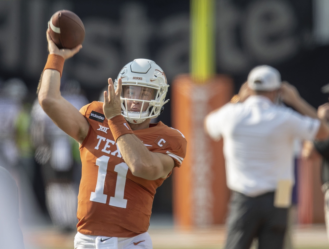 Oct 3, 2020; Austin, Texas, USA;   Texas Longhorns quarterback Sam Ehlinger (11)  Wilson warms up for the an NCAA college football game against TCU Horned Frogs at Darrell K Royal-Texas Memorial Stadium. Mandatory Credit: Ricardo B. Brazziell-USA TODAY Sports