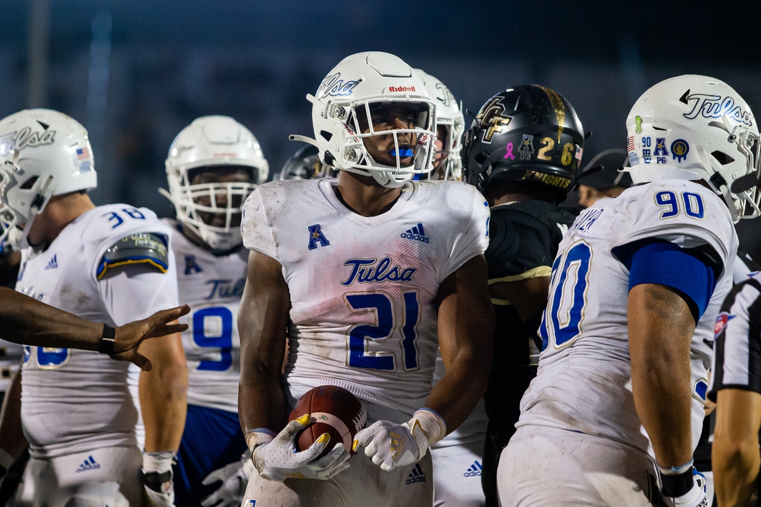 Oct 3, 2020; Orlando, Florida, USA; Tulsa Golden Hurricane running back T.K. Wilkerson (21) celebrates after scoring a touchdown during the third quarter of a game against the UCF Knights at Spectrum Stadium. Mandatory Credit: Mary Holt-USA TODAY Sports