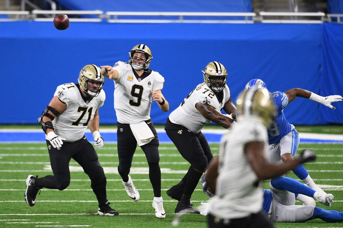Oct 4, 2020; Detroit, Michigan, USA; New Orleans Saints quarterback Drew Brees (9) throws a pass against the Detroit Lio during the second quarter at Ford Field. Mandatory Credit: Tim Fuller-USA TODAY Sports