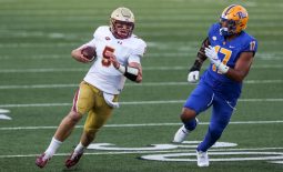 Oct 10, 2020; Chestnut Hill, Massachusetts, USA; Boston College Eagles quarterback Phil Jurkovec (5) runs the ball during the first half against the Pittsburgh Panthers at Alumni Stadium. Mandatory Credit: Paul Rutherford-USA TODAY Sports