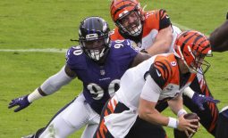 Oct 11, 2020; Baltimore, Maryland, USA;  Baltimore Ravens outside linebacker Pernell McPhee (90)rushes past Cincinnati Bengals offensive tackle Jonah Williams (73) as quarterback Joe Burrow (9) scramble during the first quarter at M&T Bank Stadium. Mandatory Credit: Tommy Gilligan-USA TODAY Sports