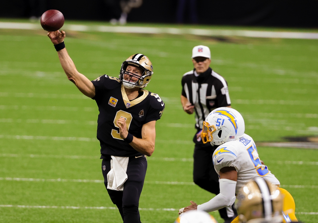 Oct 12, 2020; New Orleans, Louisiana, USA; New Orleans Saints quarterback Drew Brees (9) throws against the Los Angeles Chargers during the fourth quarter at the Mercedes-Benz Superdome. Mandatory Credit: Derick E. Hingle-USA TODAY Sports
