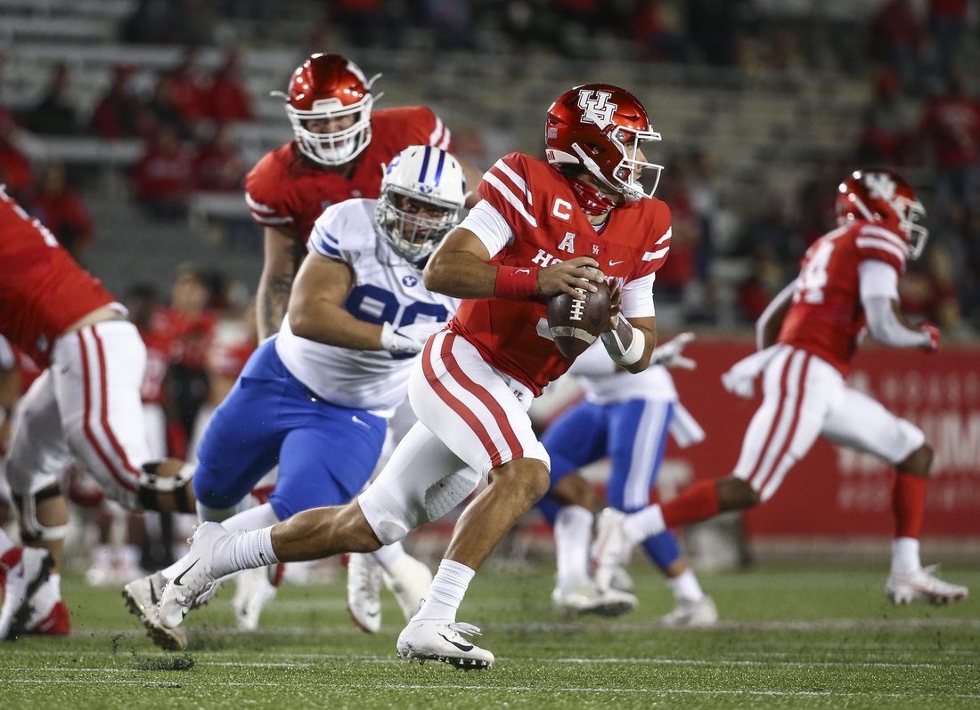 Oct 16, 2020; Houston, Texas, USA; Houston Cougars quarterback Clayton Tune (3) runs with the ball during the third quarter against the Brigham Young Cougars at TDECU Stadium. Mandatory Credit: Troy Taormina-USA TODAY Sports