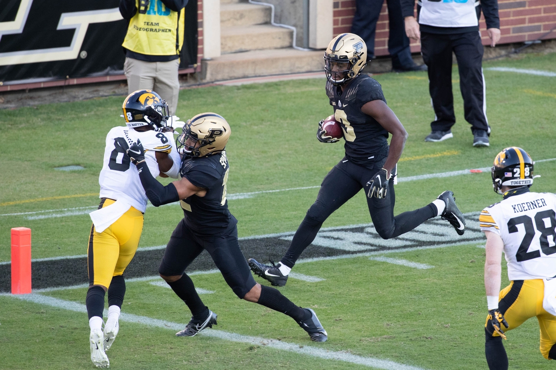 Oct 24, 2020; West Lafayette, Indiana, USA; Purdue Boilermakers wide receiver David Bell (3) runs for a touchdown in the second quarter against the Iowa Hawkeyes at Ross-Ade Stadium. Mandatory Credit: Trevor Ruszkowski-USA TODAY Sports