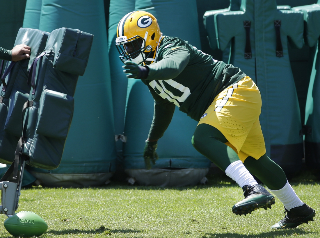June 1, 2016; Green Bay, WI, USA; Green Bay Packers defensive tackle Montravius Adams (90) participates in drills during organized team activities. Mandatory Credit: Mark Hoffman/Milwaukee Journal Sentinel via USA TODAY NETWORK