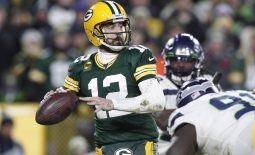 Jan 12, 2020; Green Bay, WI, USA; Green Bay Packers quarterback Aaron Rodgers (12) throws a pass against the Seattle Seahawks in the fourth quarter of a NFC Divisional Round playoff football game at Lambeau Field. Mandatory Credit: Jeff Hanisch-USA TODAY Sports