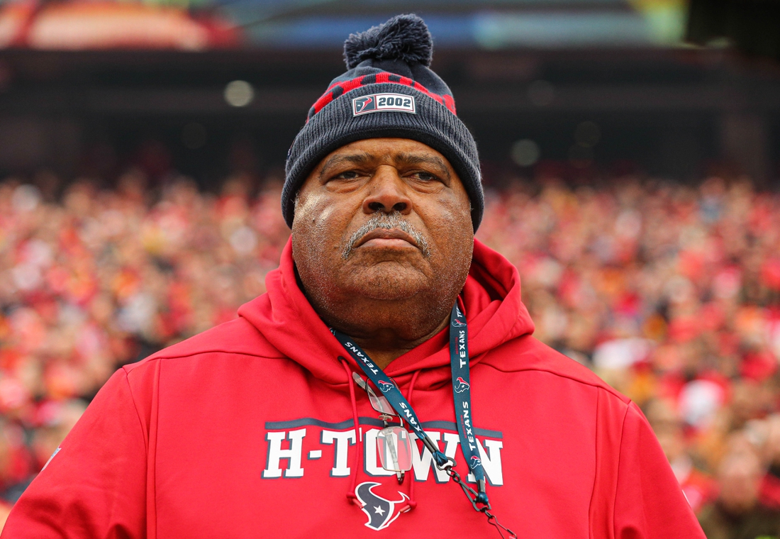 Jan 12, 2020; Kansas City, Missouri, USA; Defensive coordinator Romeo Crennel observes the national anthem before a AFC Divisional Round playoff football game against the Kansas City Chiefs at Arrowhead Stadium. Mandatory Credit: Jay Biggerstaff-USA TODAY Sports