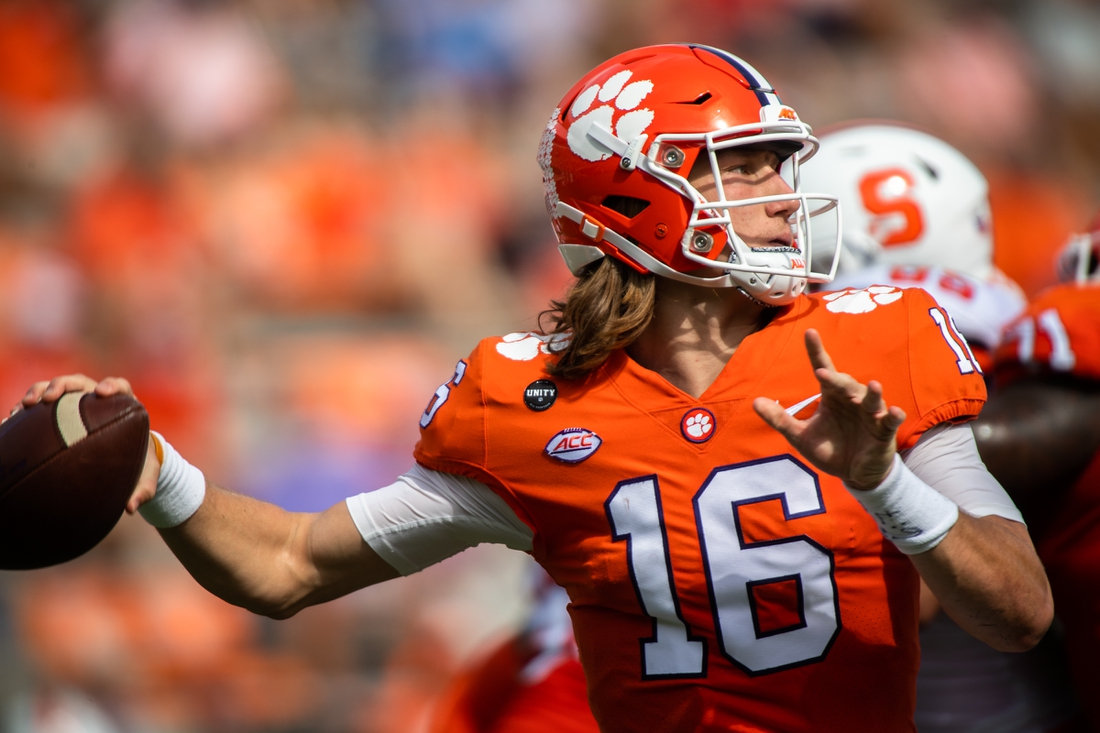 Oct 24, 2020; Clemson, South Carolina, USA;   Clemson quarterback Trevor Lawrence (16) makes a pass during their game in the second half against Syracuse at Memorial Stadium. Mandatory Credit: Ken Ruinard-USA TODAY Sports
