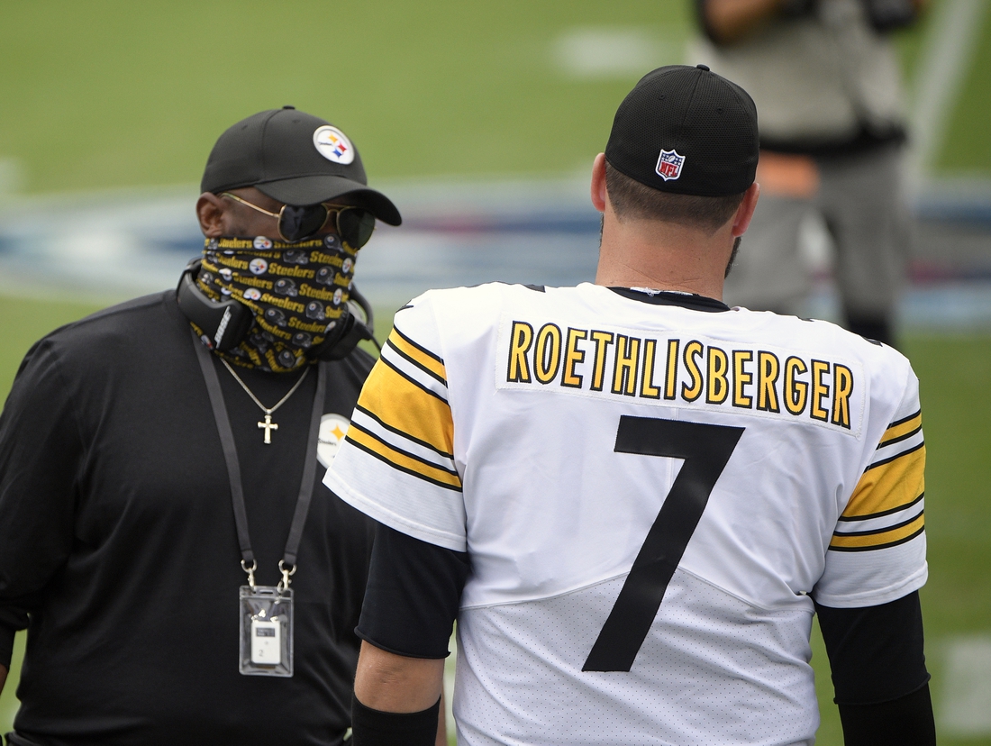 Oct 25, 2020; Nashville, Tennessee, USA;  Pittsburgh Steelers head coach Mike Tomlin talks with quarterback Ben Roethlisberger (7) just prior to the start of the game against the Tennessee Titans during the first half at Nissan Stadium. Mandatory Credit: Steve Roberts-USA TODAY Sports