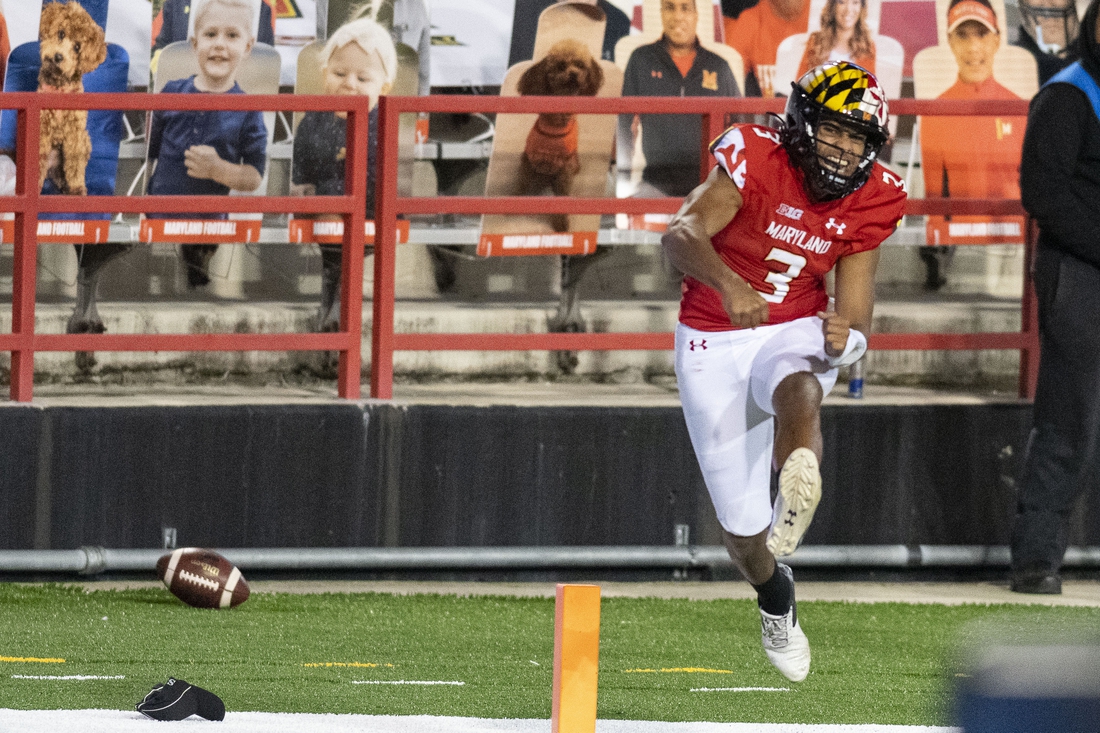 Oct 30, 2020; College Park, Maryland, USA;    Maryland Terrapins quarterback Taulia Tagovailoa (3) reacts after scoring a touchdown during overtime against the Minnesota Golden Gophers at Capital One Field at Maryland Stadium. Mandatory Credit: Tommy Gilligan-USA TODAY Sports
