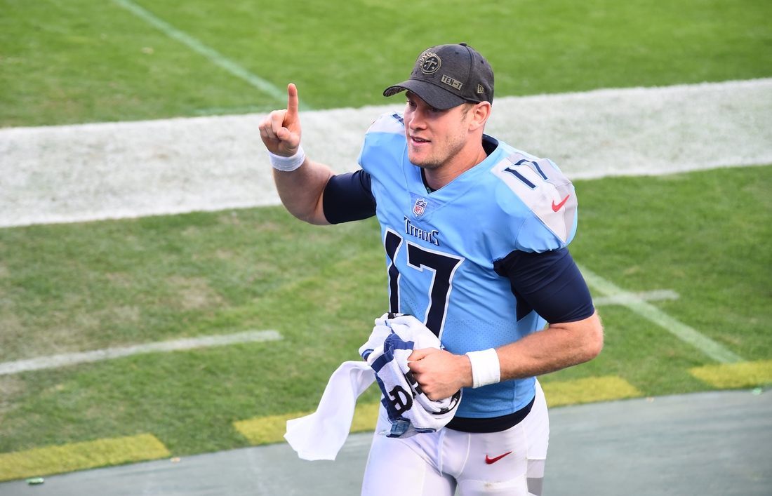 Nov 8, 2020; Nashville, Tennessee, USA; Tennessee Titans quarterback Ryan Tannehill (17) runs off the field after defeating the Chicago Bears at Nissan Stadium. Mandatory Credit: Christopher Hanewinckel-USA TODAY Sports