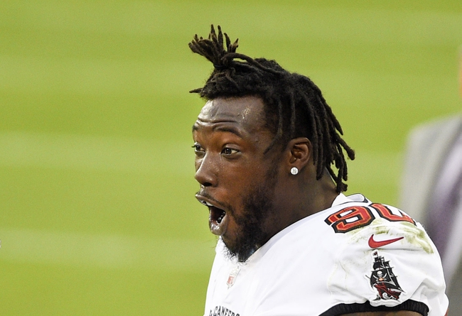 Nov 15, 2020; Charlotte, North Carolina, USA; Tampa Bay Buccaneers outside linebacker Jason Pierre-Paul (90) on the sidelines in the third quarter at Bank of America Stadium. Mandatory Credit: Bob Donnan-USA TODAY Sports
