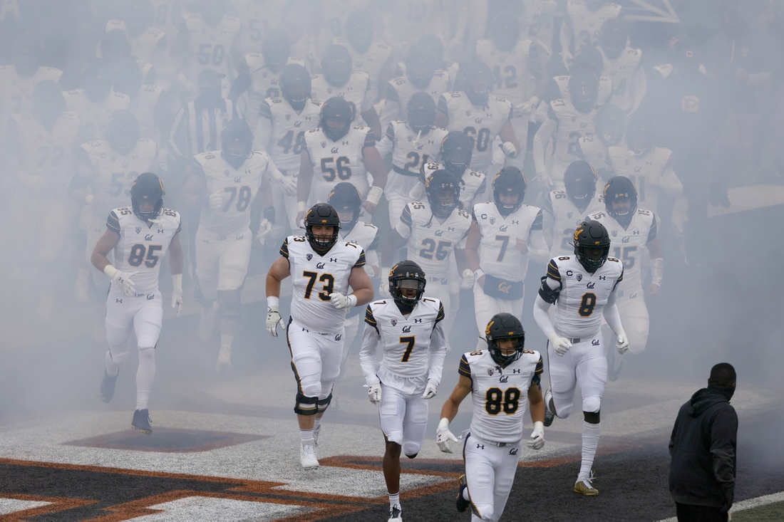 Nov 21, 2020; Corvallis, Oregon, USA; California Golden Bears players run onto the field prior to a game against the Oregon State Beavers at Reser Stadium. Mandatory Credit: Soobum Im-USA TODAY Sports
