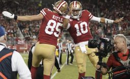 Nov 24, 2019; Santa Clara, CA, USA; San Francisco 49ers tight end George Kittle (85) and quarterback Jimmy Garoppolo (10) celebrate after scoring a touchdown against the Green Bay Packers during the third quarter at Levi's Stadium. Mandatory Credit: Stan Szeto-USA TODAY Sports